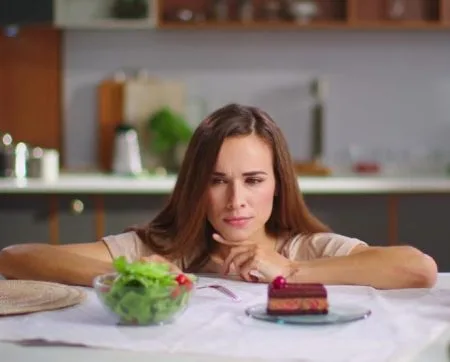 overwhelmed cook with ingredients